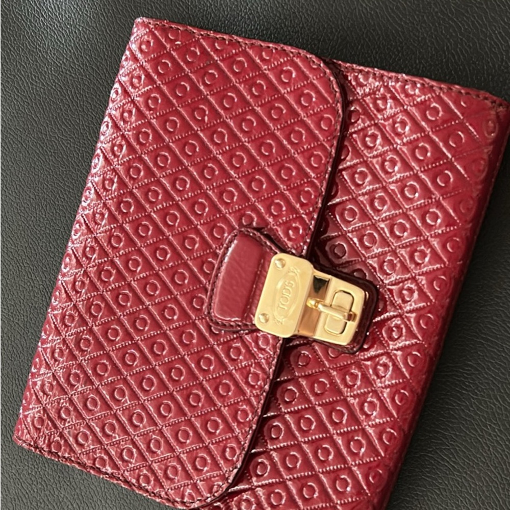 Tod's Burgundy Leather Accessory with Gold Detail